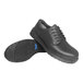 A pair of black Genuine Grip men's leather shoes with laces and rubber soles.