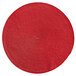 A red woven round RITZ® placemat.