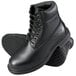 A pair of Genuine Grip black leather boots.