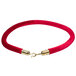 A red velvet rope with brass ends.