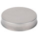 A round metal cake pan with a white background.