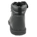 A Genuine Grip black leather boot with a zipper on the side.