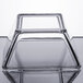 A clear glass square bowl with a square base.