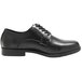 A black Genuine Grip men's oxford shoe with laces and a rubber sole.