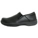 A Genuine Grip black leather slip-on shoe with a rubber sole.