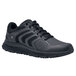 A black water-resistant non-slip athletic shoe for women with laces.