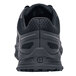The back of a black Shoes For Crews Course athletic shoe.