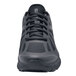 A close-up of a black Shoes For Crews Endurance II athletic shoe.