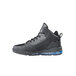 A black Shoes For Crews Tigon athletic shoe with blue soles and laces.