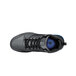A black Shoes For Crews Tigon men's athletic shoe with a blue sole.