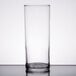 A Libbey straight sided clear glass on a table.