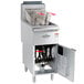A Main Street Equipment stainless steel gas floor fryer with two baskets inside.
