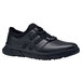 A black Shoes For Crews Karina women's athletic shoe with laces.