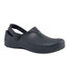 A black non-slip Shoes For Crews clogger with a rubber sole and strap.
