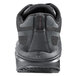 The back of a black Shoes For Crews Energy II athletic shoe with a gray sole.