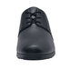 A black leather Shoes For Crews Madison III women's dress shoe with laces.