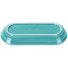 A turquoise oval china bread tray with white trim.