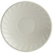 A white Tuxton saucer with a swirl rim.