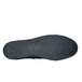 The black rubber sole of a Shoes For Crews Pembroke canvas shoe.