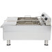 An APW Wyott stainless steel countertop deep fryer with two baskets.