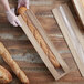 Durable Packaging BB5222N 22" x 5 1/4" x 3 1/4" Kraft Paper Windowed Bread Bag - 1000/Case Main Thumbnail 1