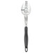 A Vollrath Jacob's Pride slotted basting spoon with a black Ergo Grip handle.