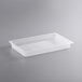 A white translucent Cambro polypropylene food pan with a white lid.