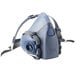 A 3M half face respirator with Cool Flow valve.