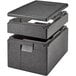 A black Cambro Cam GoBox top loading food pan carrier with the lid open.