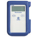 A white and blue Comark KM28B thermocouple thermometer with a blue screen.
