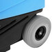 A blue and black Mytee Grand Prix carpet extractor with wheels.