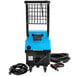A blue and black Mytee 1600 Focus corded vapor steamer with a black cord and hose.