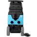A black and blue Mytee 2002CS Contractor's Special carpet extractor with wheels.