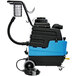 A blue and black Mytee Lite carpet extractor with a hose.