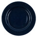 A navy blue Crow Canyon Home enamelware salad plate with a speckled surface and wide rim.