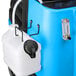 The blue and white Mytee LTD3 Speedster carpet extractor water tank with a hose attached.