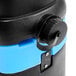 A close up of a black and blue Mytee S-300H Tempo water container.