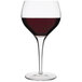 A Luigi Bormioli Michelangelo burgunder wine glass with red wine.