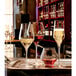 A group of Luigi Bormioli Supremo Bordeaux wine glasses on a tray.