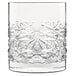 A Luigi Bormioli Mixology clear glass with a facet design.