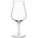 A clear Luigi Bormioli Birrateque beer tester glass with a stem on a white background.