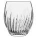 A clear Luigi Bormioli stemless wine glass with curved wavy lines.