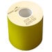A roll of MAXStick canary yellow thermal paper with numbers and words on it.