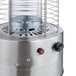 A stainless steel Backyard Pro portable patio heater with a glass tube.