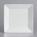 A white square International Tableware porcelain plate with a square cut out in the middle.