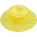 A yellow plastic squeeze bottle valve with a circle on top.