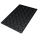 A black Silikomart silicone baking mold with 35 square cavities.