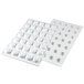 A white Silikomart silicone baking mold tray with 35 rectangular cavities.