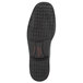 The black sole of a Rockport Works men's oxford dress shoe.