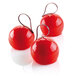 A group of red round objects with strings attached.